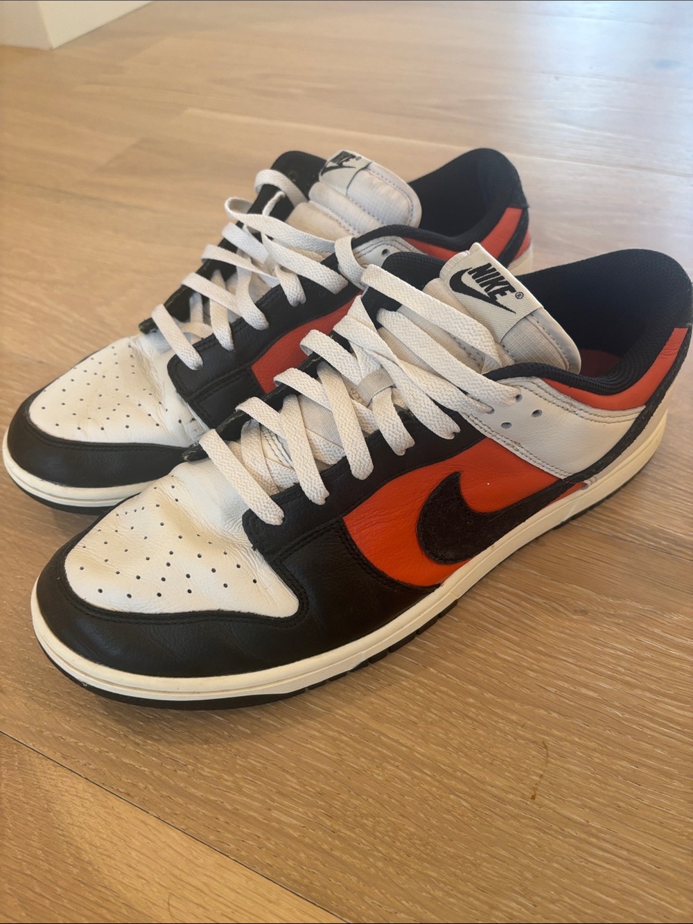 Nike Dunk Low Sneakers in White, Black & Orange (Vintage Coral) HQ4988-030